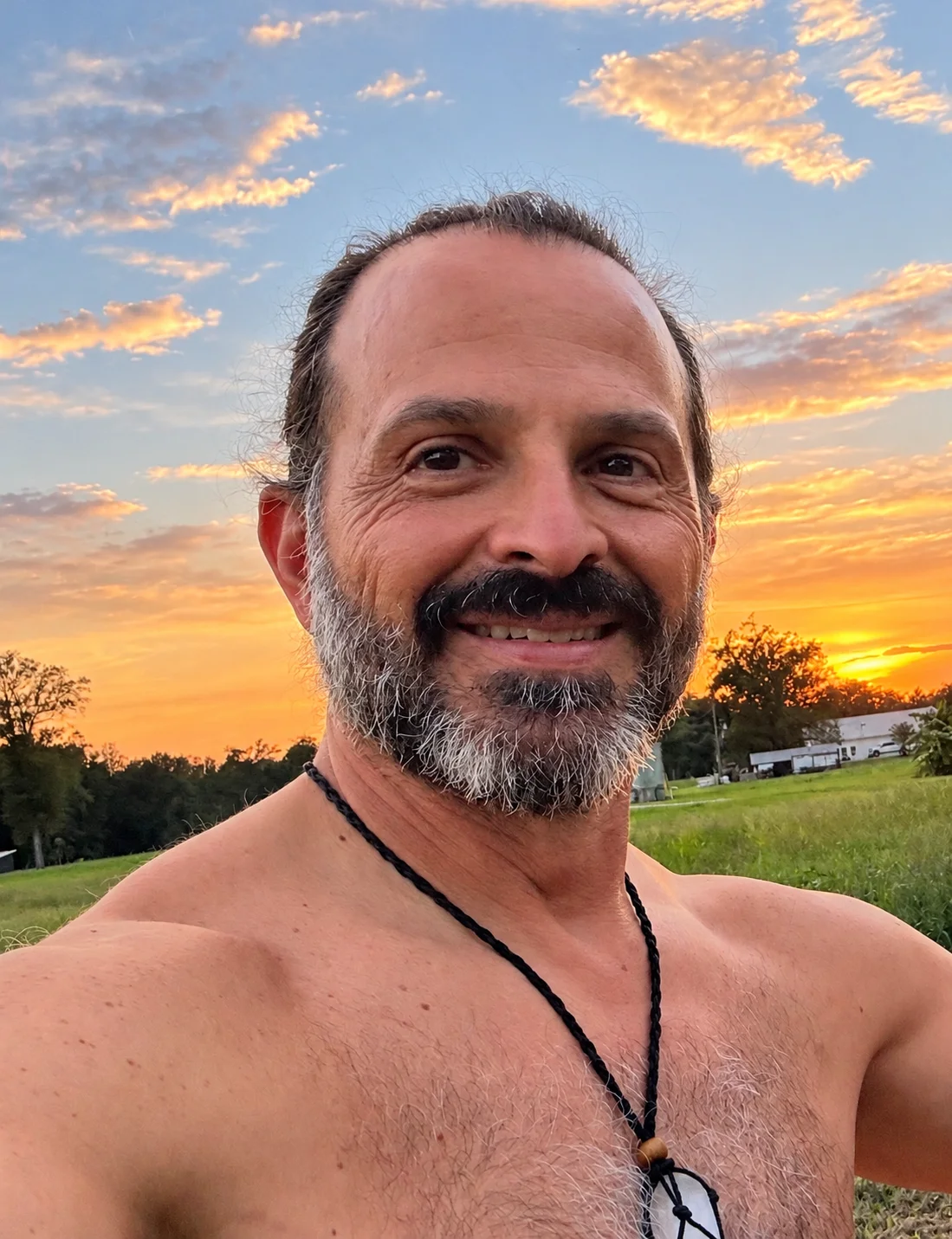 Justin Ansel outdoors at sunset